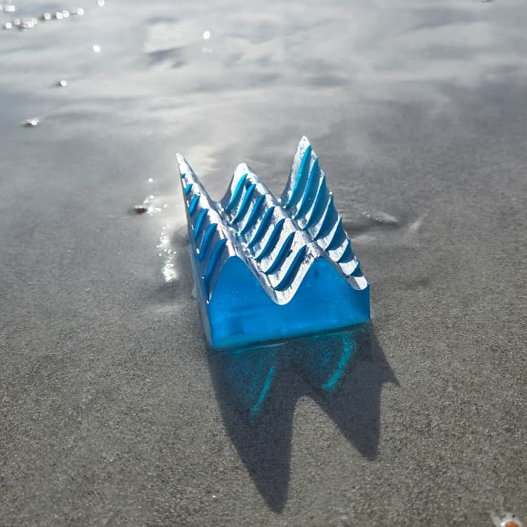 Blue resin tide keepsake on the Florida coast